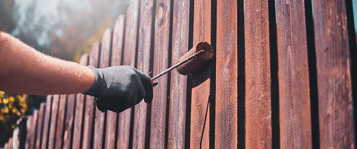 Man working on fence